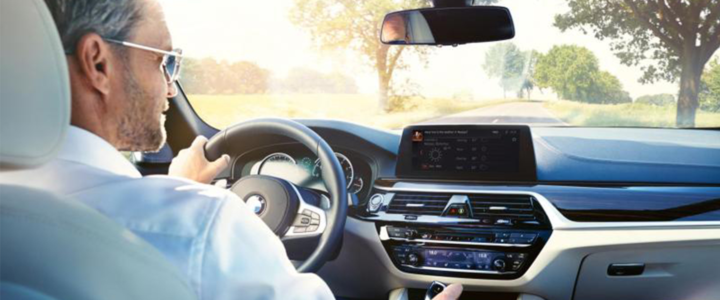Man interacting with car interior