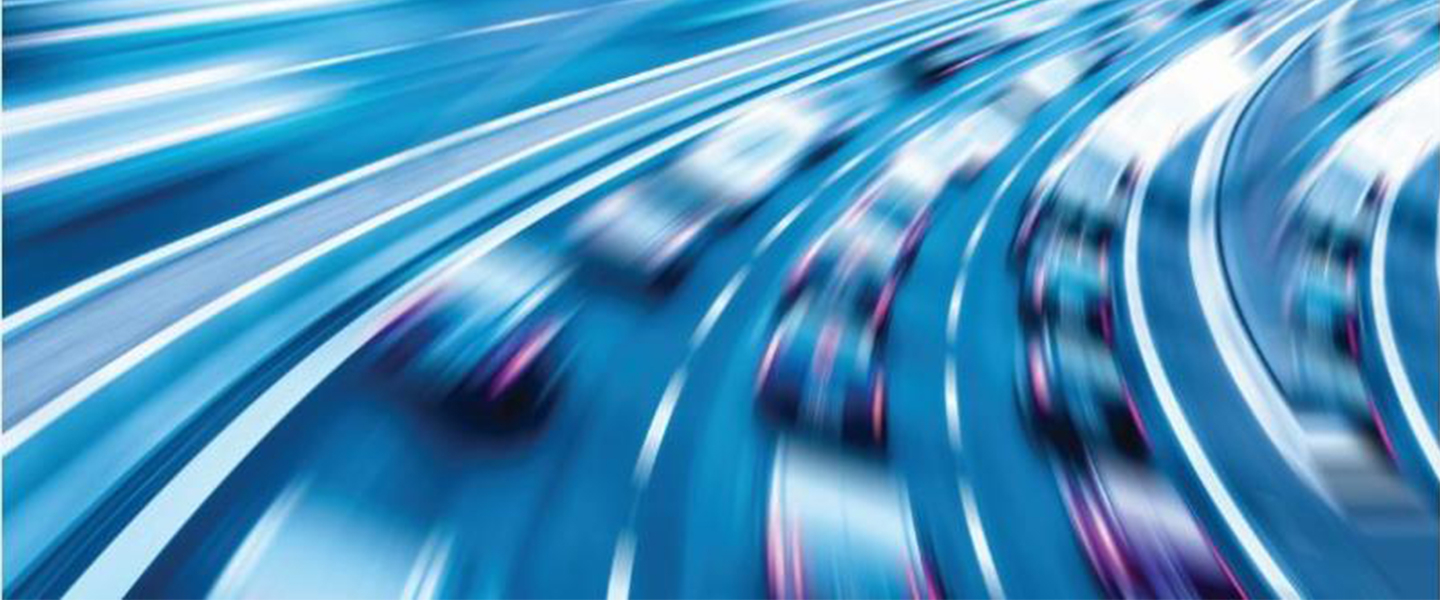 Blurred shot of car driving down a highway